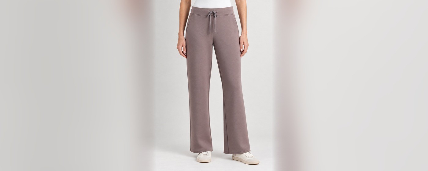 Mauve wide-leg knit lounge pants with an elasticated drawstring waist and side pockets for private label homewear