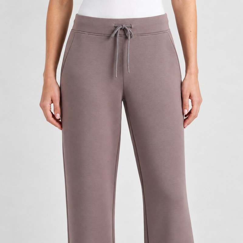 Close view of the drawstring waist and side pocket on mauve wide-leg knit lounge pants