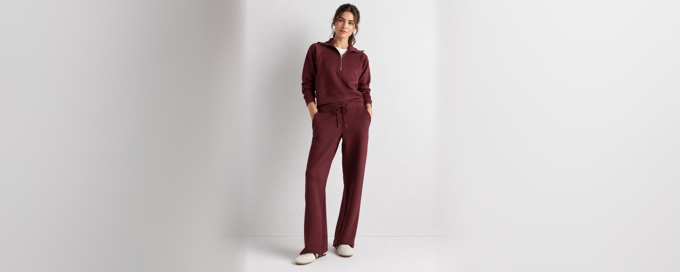 Burgundy half-zip knit lounge set with a stand collar top and wide-leg pants for private label knit loungewear