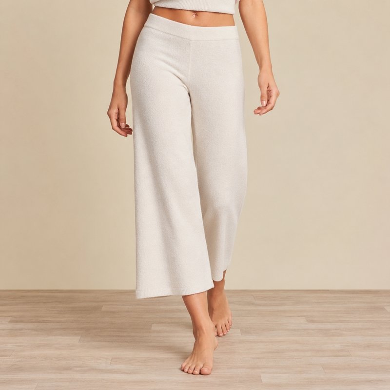 Close view of the elasticated waistband and cropped wide leg on cream knit lounge pants