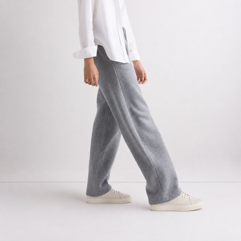 Close view of the drawstring waist and straight open hem on heather grey lounge sweatpants