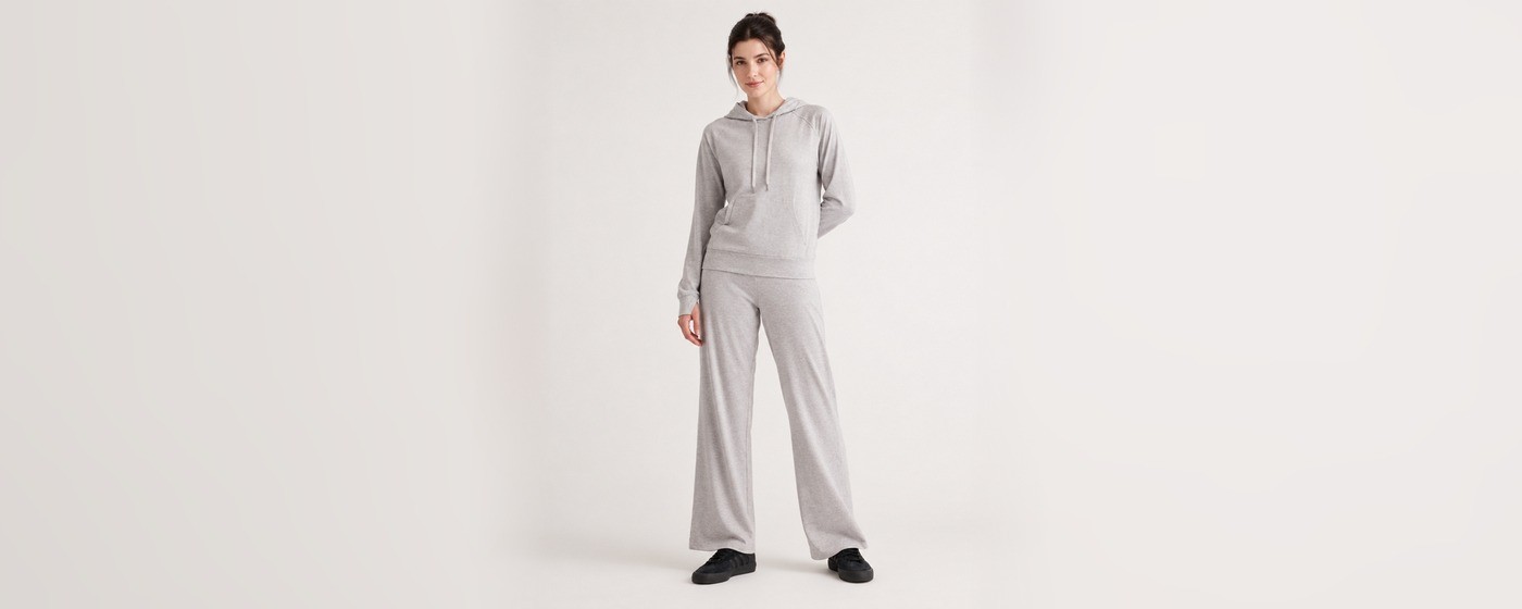 Light grey hoodie and wide-leg pants set with a kangaroo pocket and drawstring waist for private label hoodie lounge sets