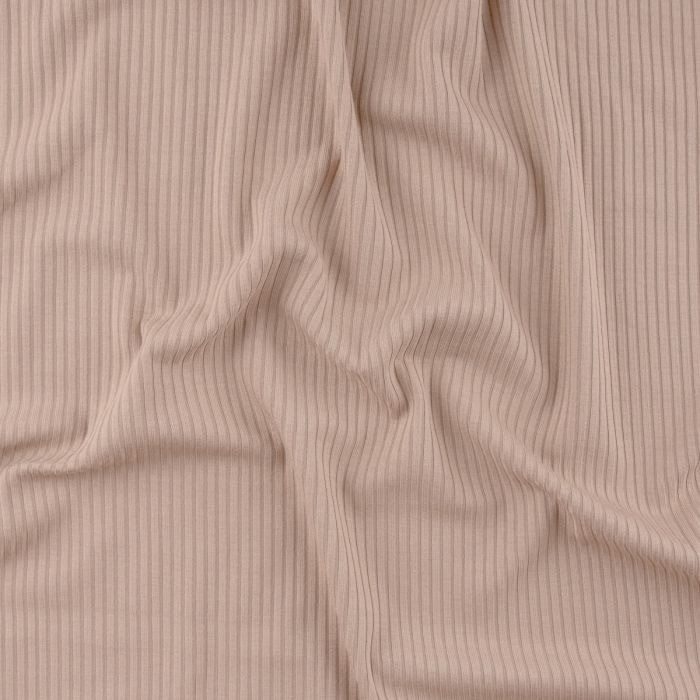 Dusty pink bamboo rayon fabric with fine vertical stripes and a soft drape