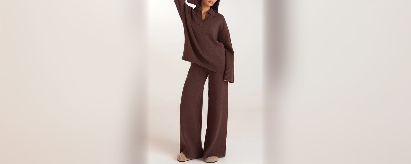 Chocolate brown half placket knit jumper with an open polo collar worn with matching wide leg knit trousers