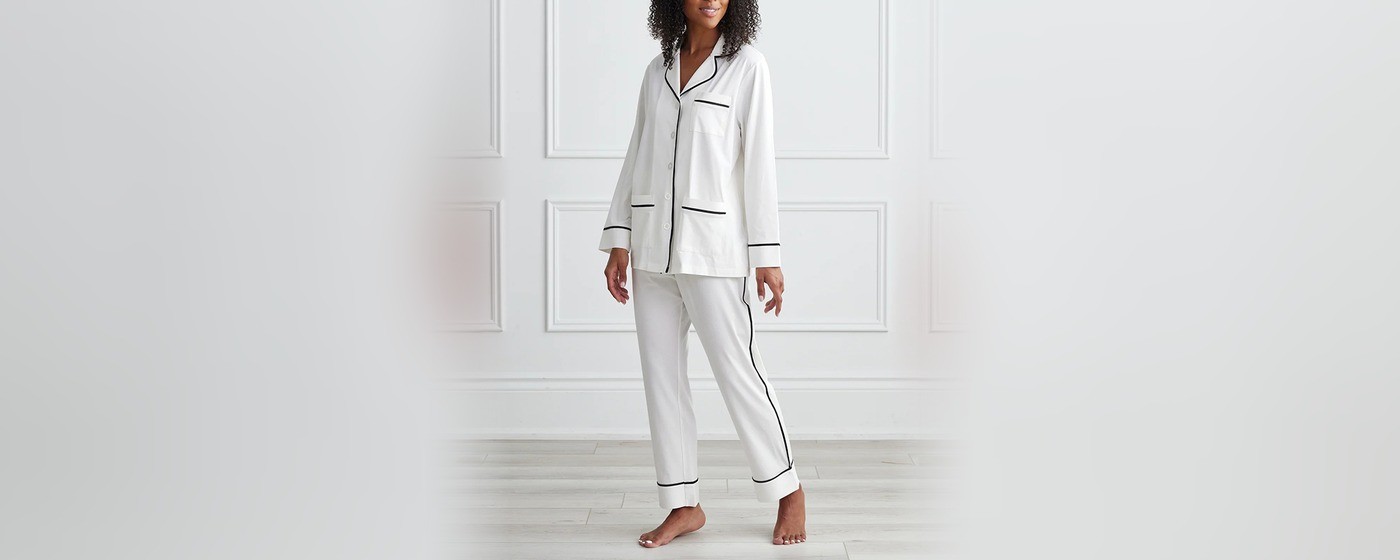 Ivory stretch cotton pajama set with a notch collar shirt, contrast piping and matching long pants