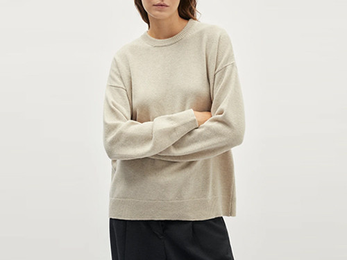 Oatmeal lambswool crew neck knit sweater with dropped shoulders and a soft brushed surface