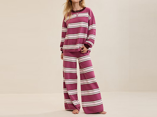 Pink and white striped knit sweater and wide leg trouser set cut from the same dye lot