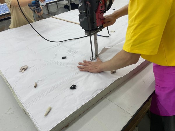KoalaPurr's garment production workshop. Factory image shown for illustration.