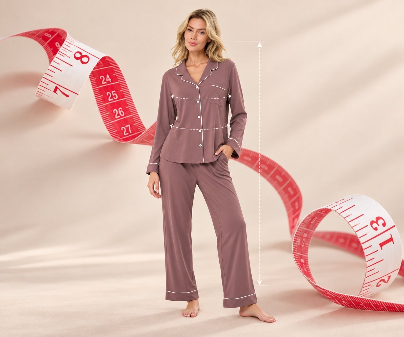 Woman wearing a mauve pajama set with measuring tape and measurement guides