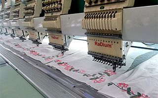 Embroidery equipment in KoalaPurr’s manufacturing setup