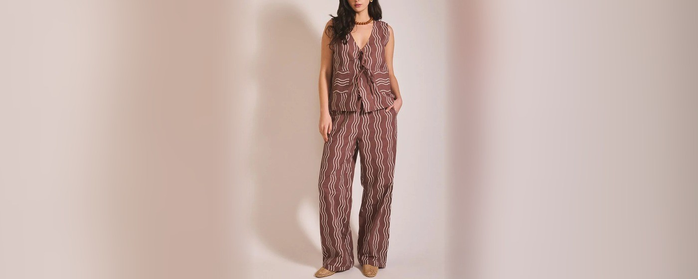 Women's brown cotton tie front vest with a cream wavy stripe print