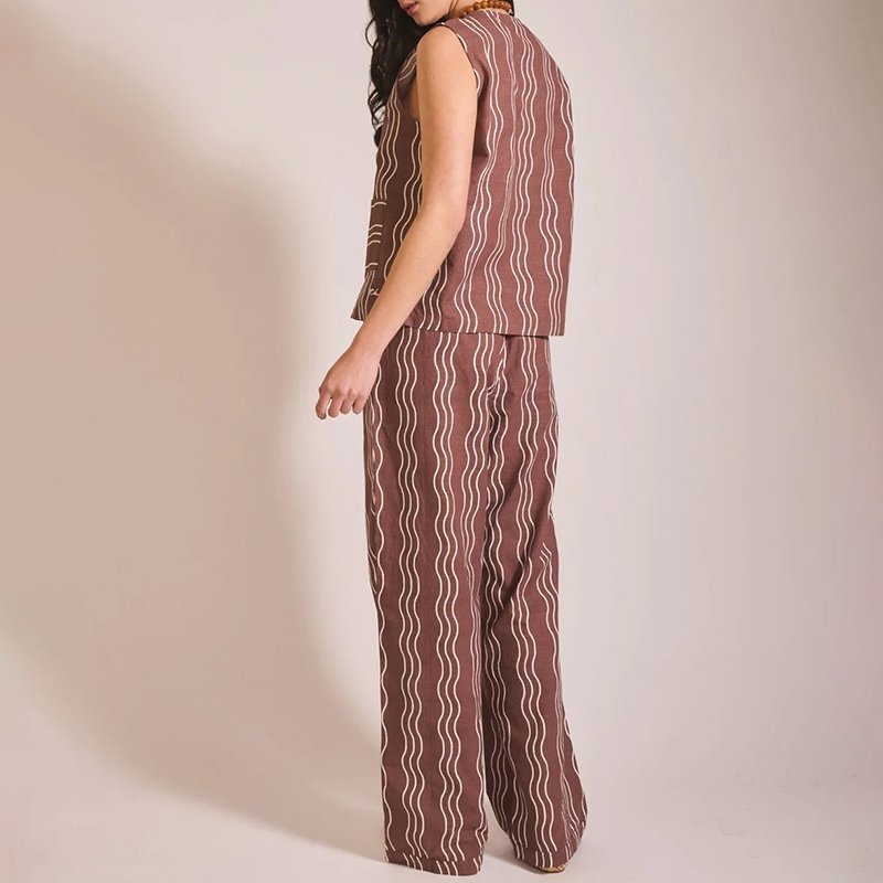 Close-up of the front tie and wavy stripe print on a cotton vest