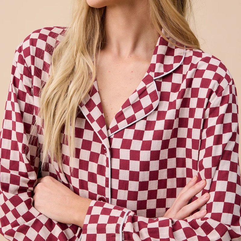 Close-up of the piped notch collar and checkerboard print on the pajama shirt