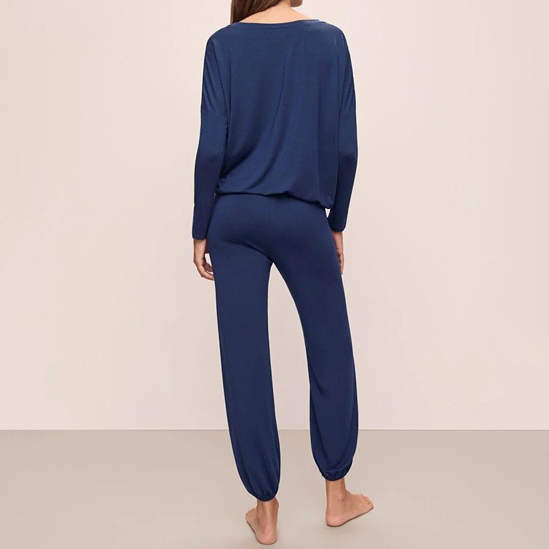 Side view of the blouson hem and elasticated jogger cuff on the navy modal pajama set