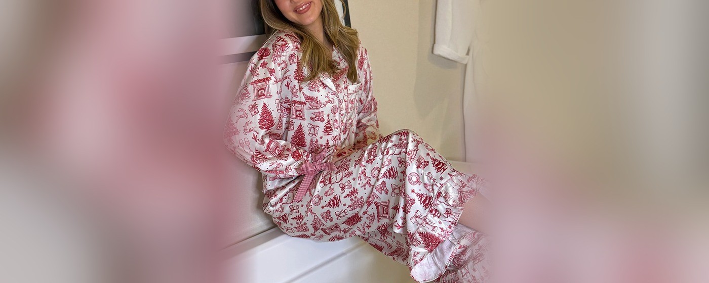 Red and cream Christmas toile print pajama set with ruffle cuffs and a gingham drawcord