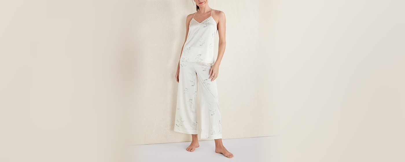 Ivory satin cami and wide leg pant set with a delicate blue floral print