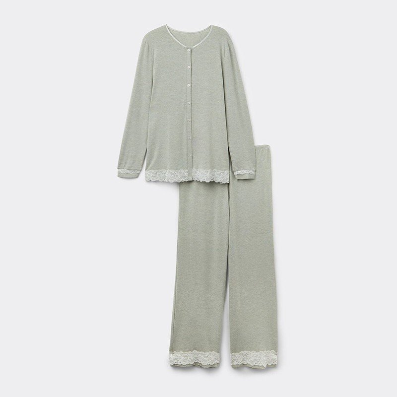 Close-up of the scalloped lace hem and pearl buttons on the modal pajama set