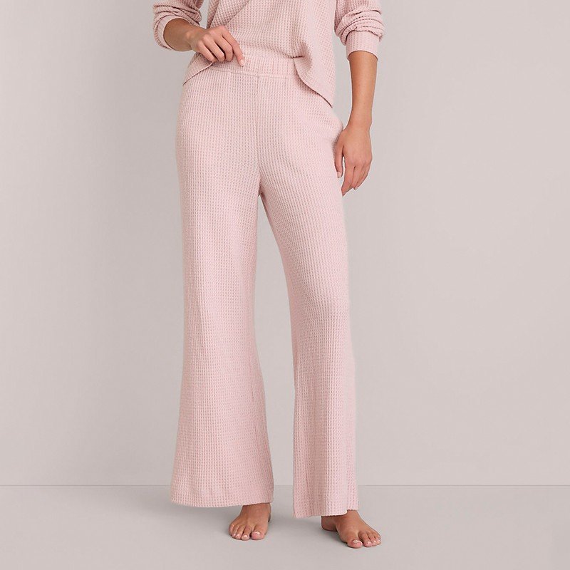 Close-up of the waffle texture and elasticated waist on the blush knit pajama pants