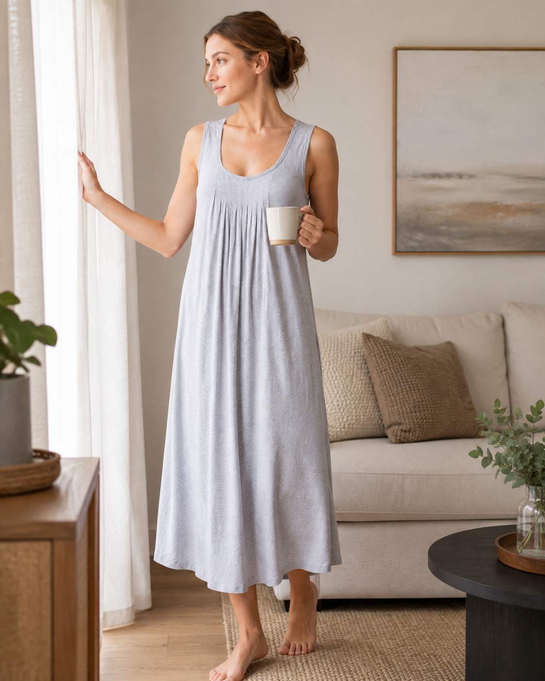 Modal nightgown detail showing scoop neckline, soft fabric texture and decorative front pleats