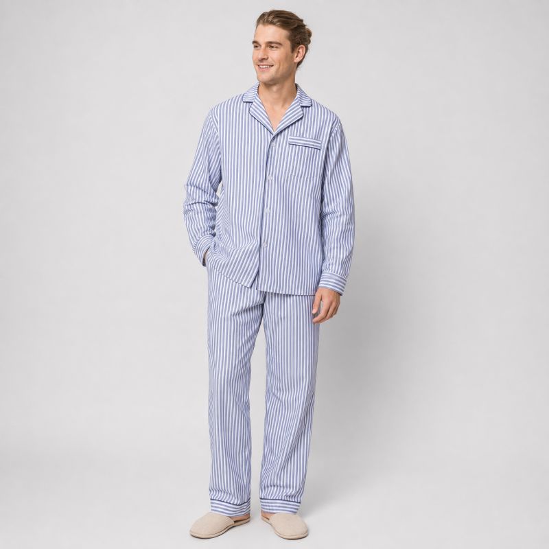 Man wearing a blue striped woven pajama set with notch collar and chest pocket