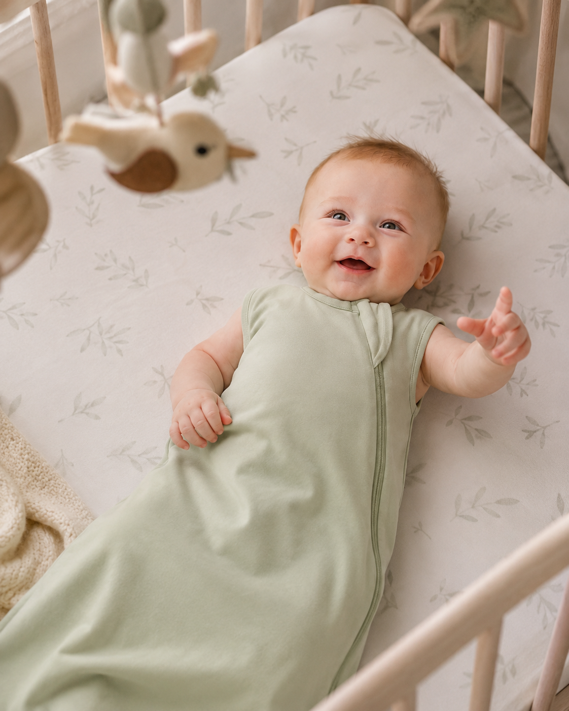 Cotton infant sleeping bag detail showing full side zipper, smooth binding and soft inner lining