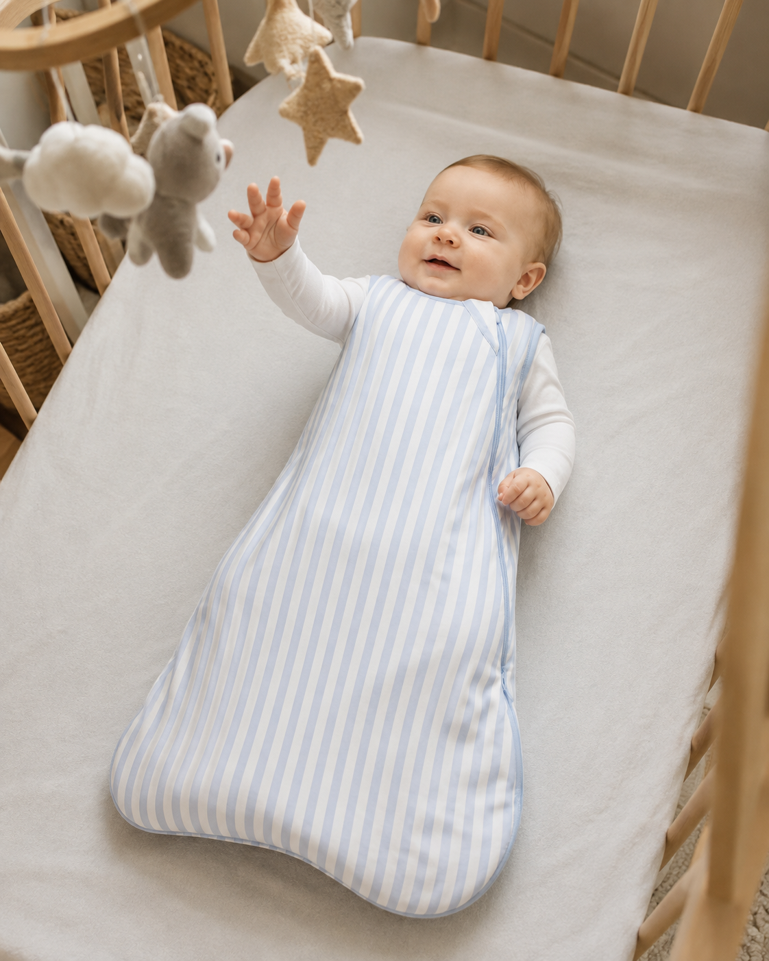 Bamboo infant sleep sack detail showing blue trim, side zipper construction and soft inner lining
