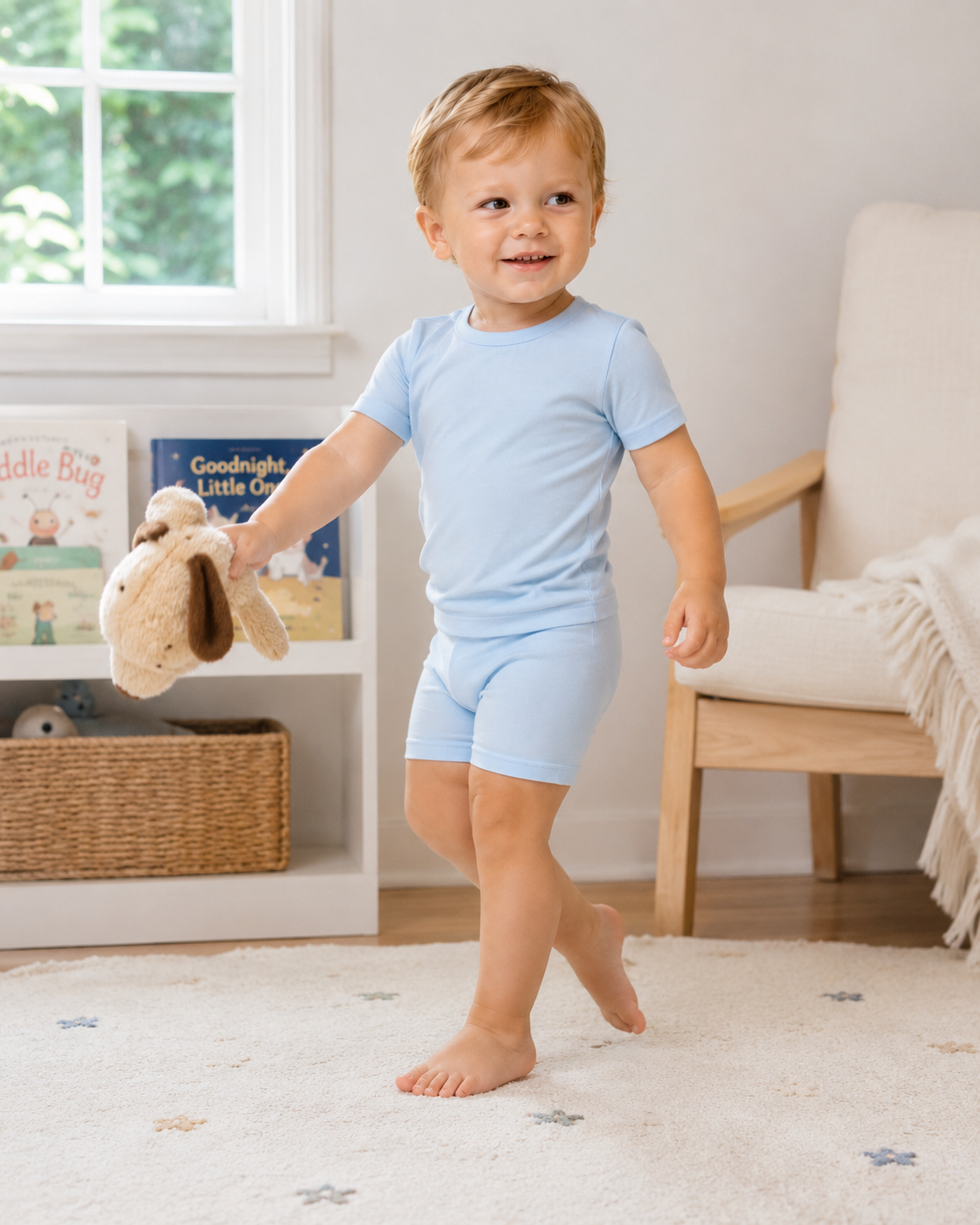 Light blue bamboo kids pajama set showing short sleeve top and matching shorts