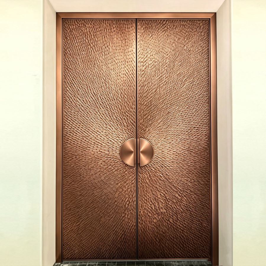 Gold aluminum entrance door with a ten millimetre front plate
