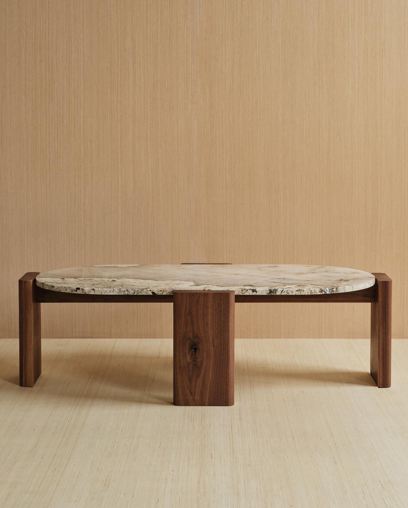 Oval natural marble coffee table with a walnut veneer base