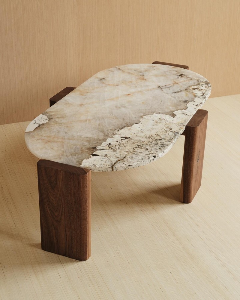 Top view of an oval marble coffee table showing its natural veining