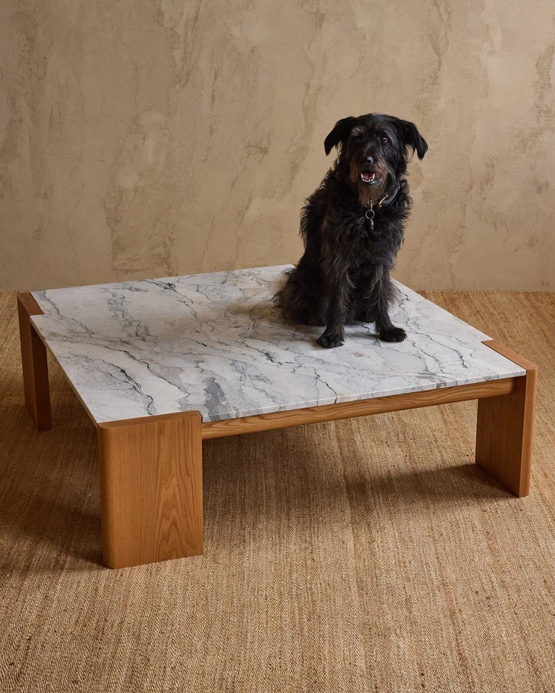 Marble and wood coffee table in a hotel lounge setting