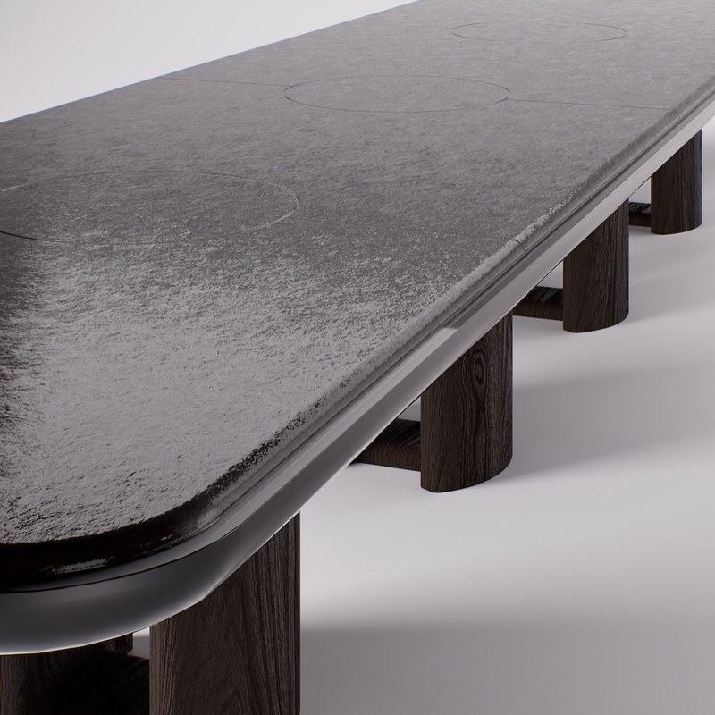 Close-up of the gray marble tabletop and circular surface details
