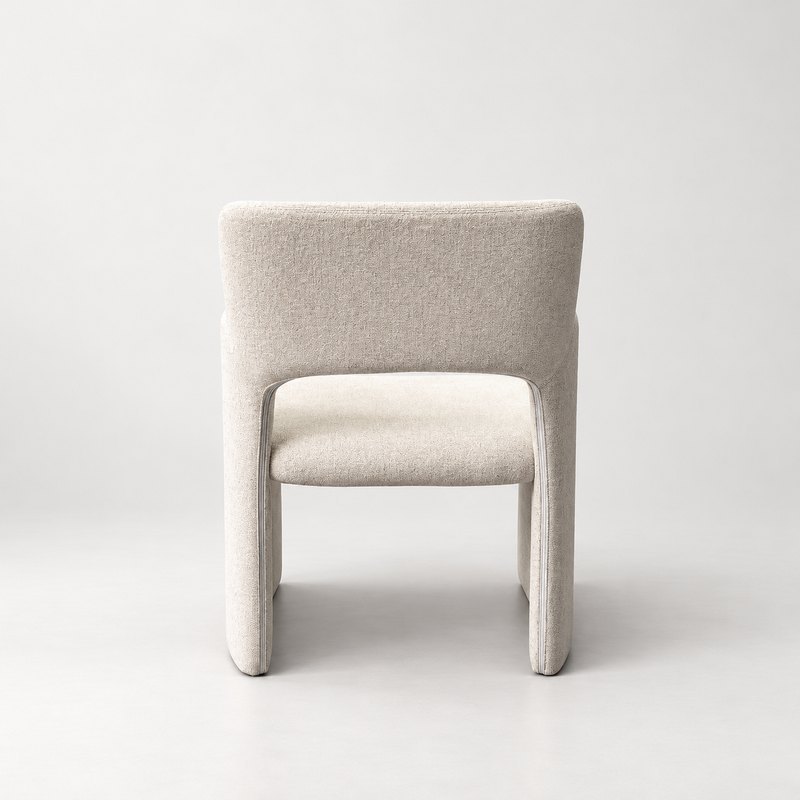 Rear view of ivory upholstered hotel armchair with floor-length side supports