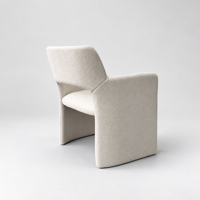 Rear three-quarter view of ivory upholstered hotel accent armchair
