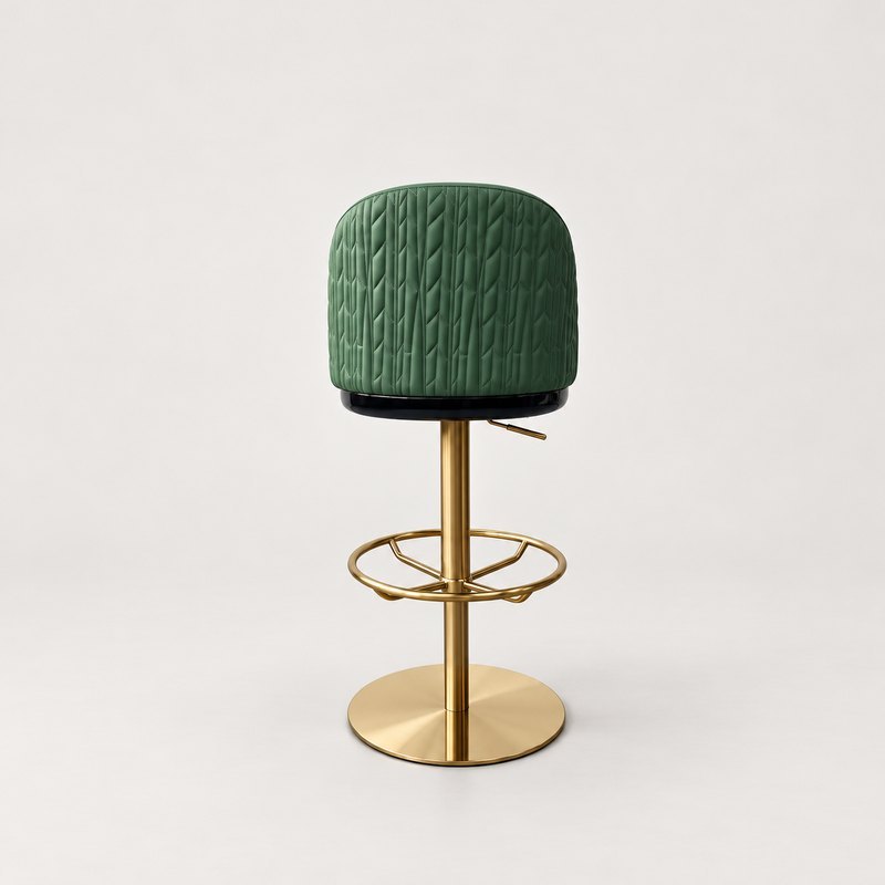 Rear view of the green leather bar stool showing its elongated geometric quilting