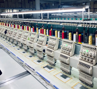 Multi-head embroidery machines for custom apparel production