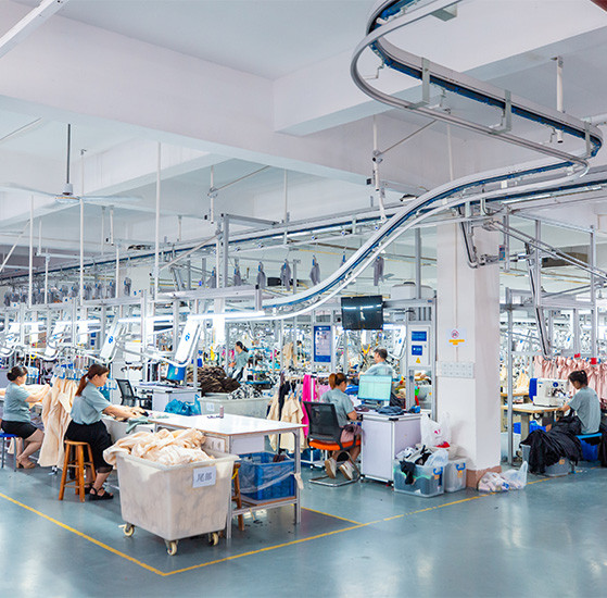 Garment workers producing apparel in MinCharm's Dongguan factory