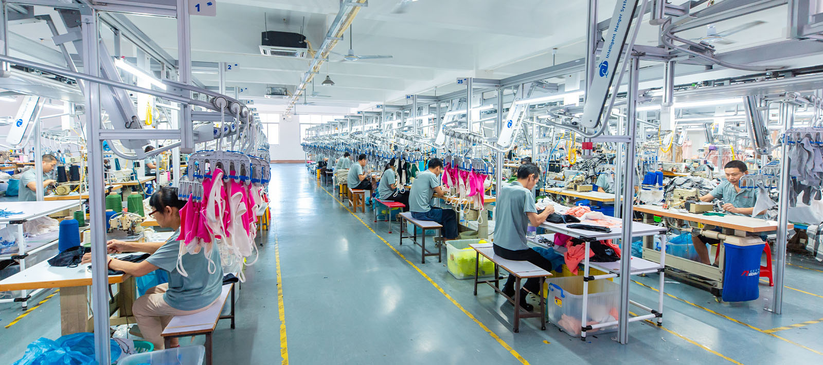 Apparel production lines at MinCharm's factory in Dongguan, China