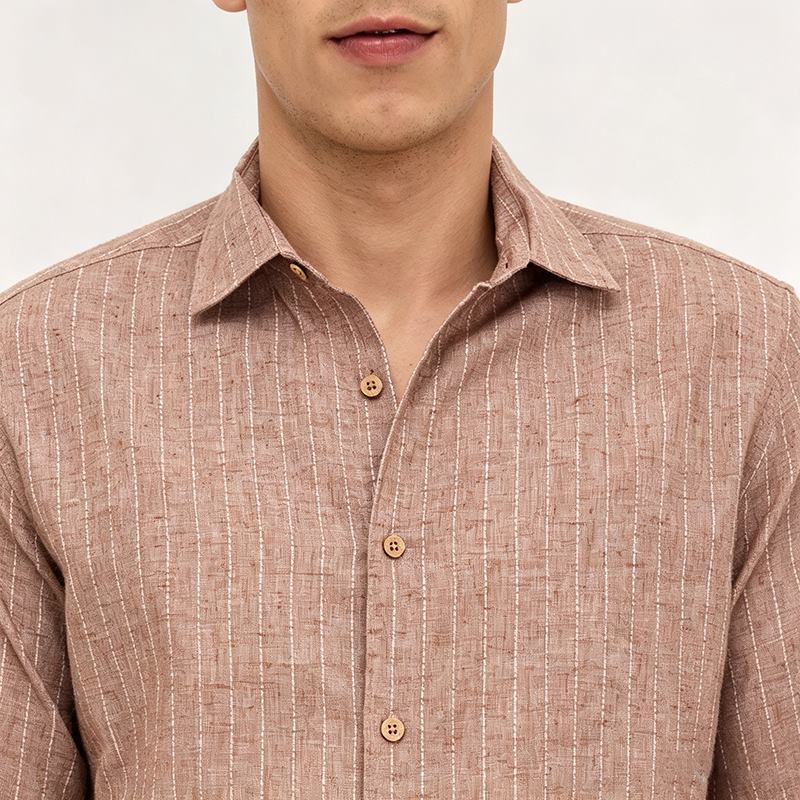 Close-up of fine stripe fabric, point collar and button placket
