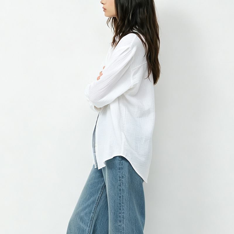 Women's white button-up shirt side view