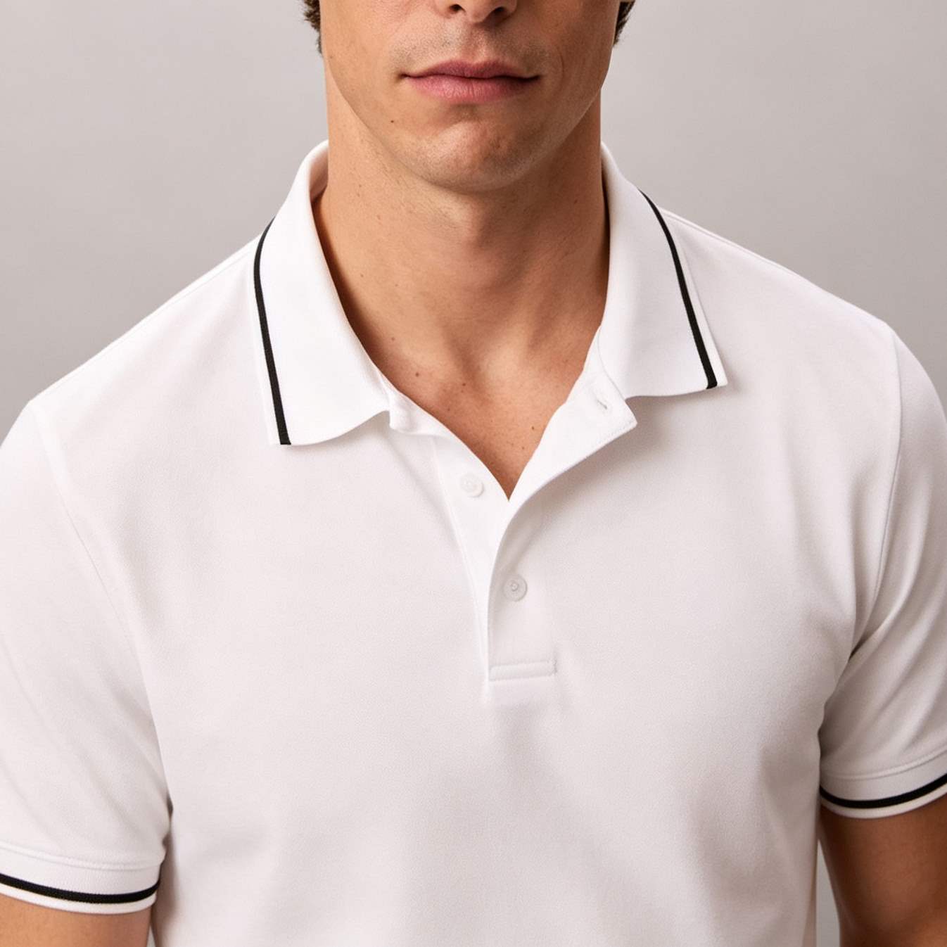 White polo shirt with contrast trim sleeve cuff