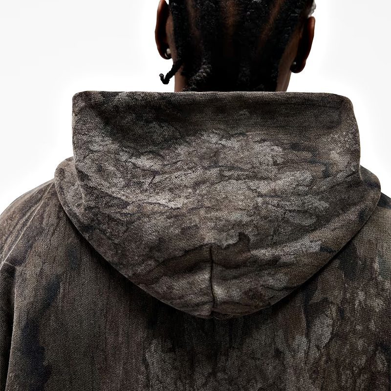 Close view of hood and mottled surface on charcoal hoodie
