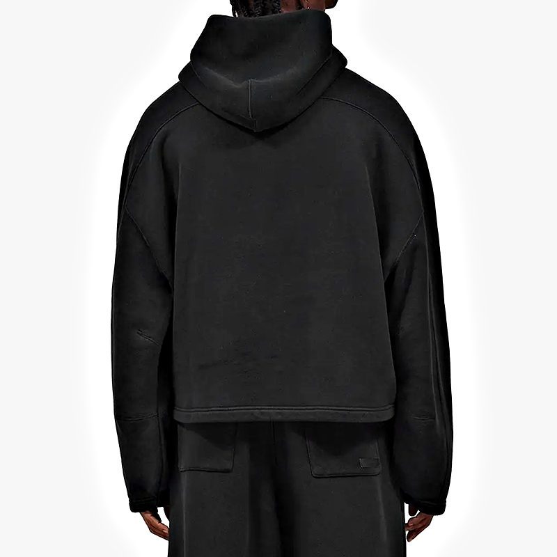 Back view of black hoodie with lined hood and tonal stitching