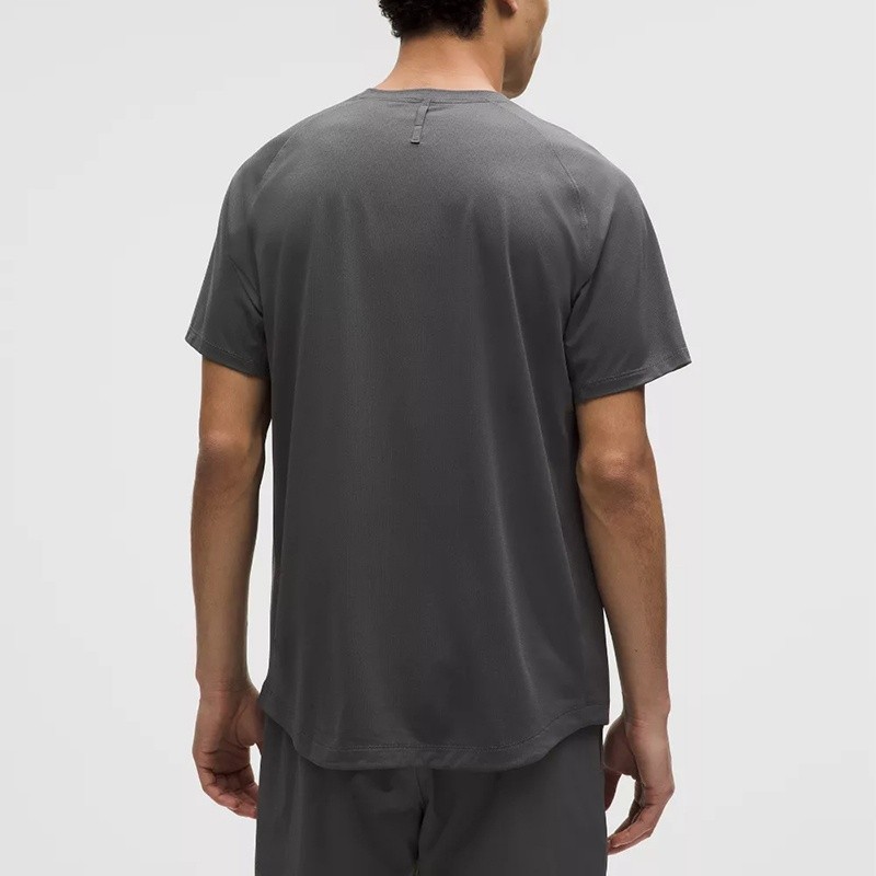 Back view showing raglan sleeves and back neck tab