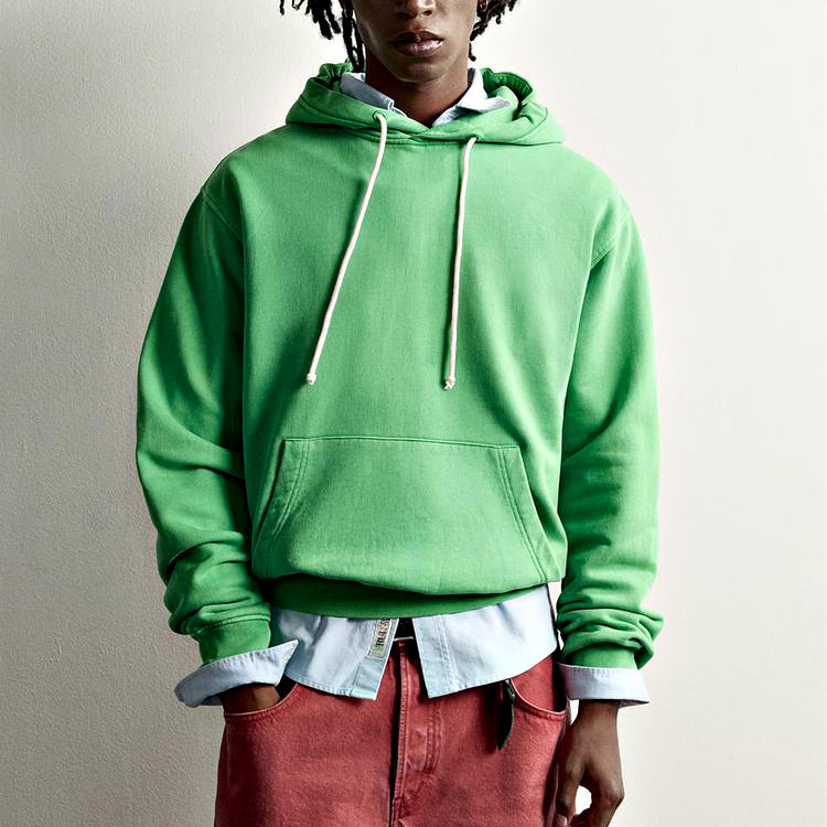 Men's garment-washed green hoodie front view showing relaxed fit and kangaroo pocket