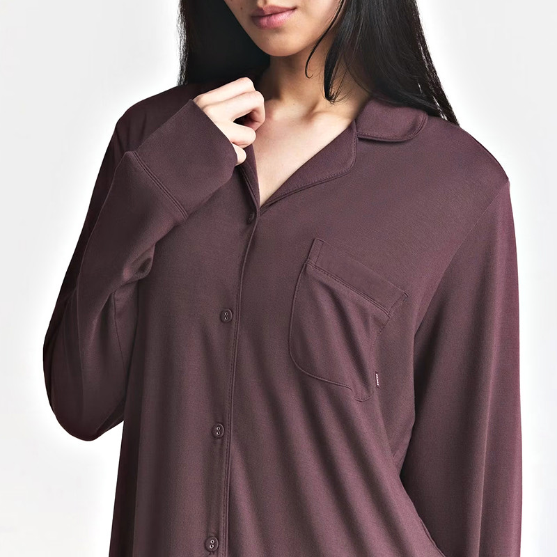 Burgundy button-front pajama top chest pocket and piped trim detail