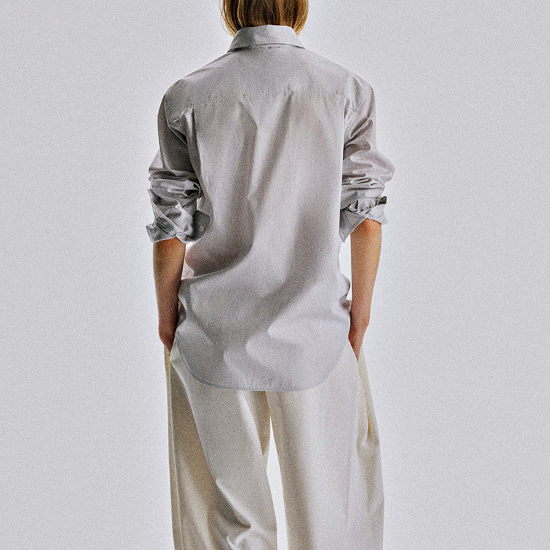 Back view of women's fine stripe long sleeve shirt
