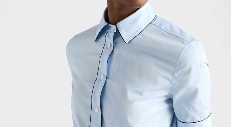 Brand-free front view of the light blue contrast-piping short sleeve button shirt