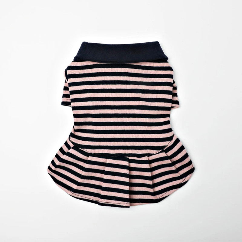 Close-up of dog striped shirt dress hem and stripe
