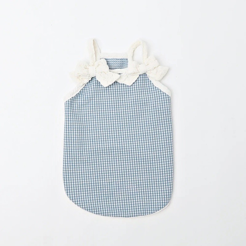 Close-up of dog camisole bow and strap edge
